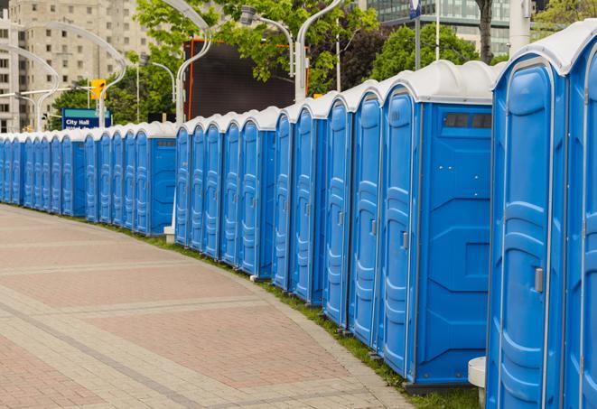 a row of portable restrooms ready for eventgoers in Castaic